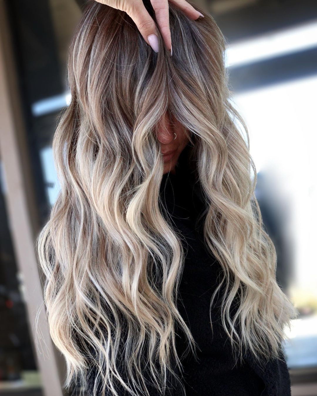 Chic Long Wavy Ash Bronde Hairstyle