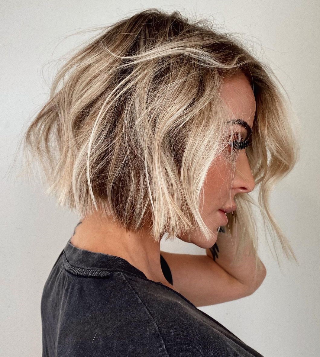 Chin-Length Shaggy Bob with Blonde Highlights